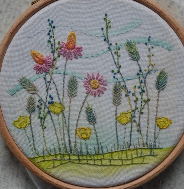 Embroidered filed of flowers